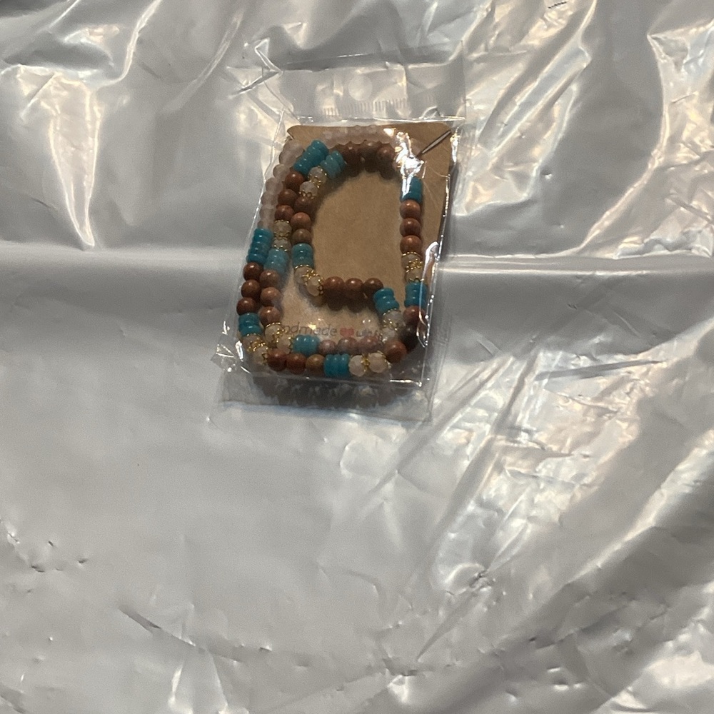 Elegant Beaded Necklace with Turquoise and Brown Accents